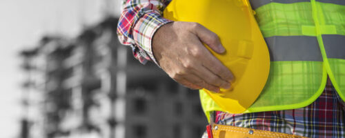 Worker,Holding,Hard,Hat,Close,Up,Shot